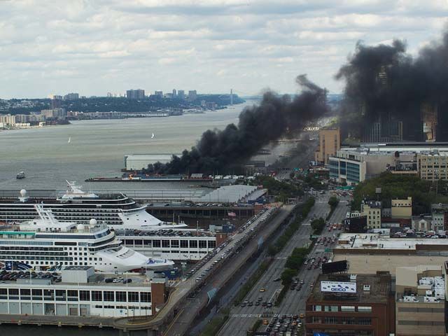 Fire emerges from the pier and moves west